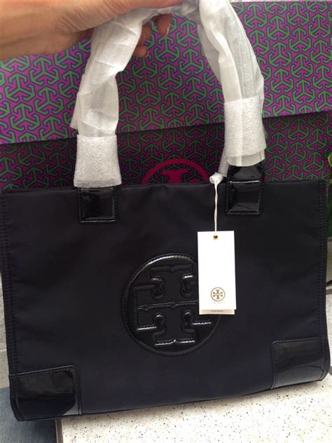 bolsa tory burch negra original precio